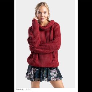 Francesca’s ongel shaker pullover sweater
